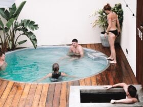 Guests sitting in the hot pool and ice bath
