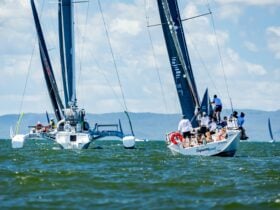 two sailing boats racing across the ocean