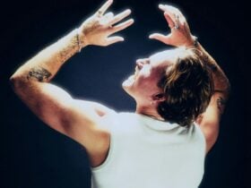 Ben Gerrans with hands in the air