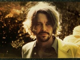 Bernard with long hair and beard with sun shining on his hair