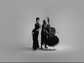 Camerata: Sophie Ellis holding Viola and Marian Heckenberg holding Double Bass