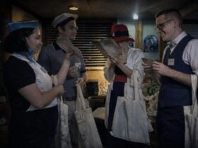 People dressed in old world sailing costume