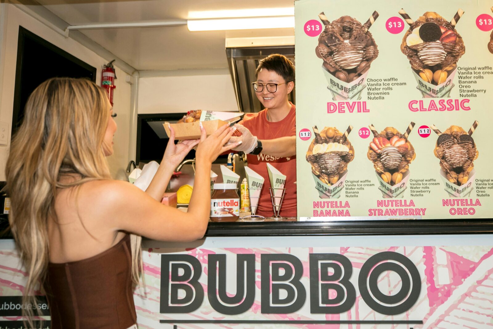 Guest purchasing food from food truck