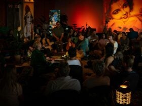 Group of people meditating with music
