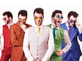 Image of one man duplicated 5 times. Wearing different suit outfits in each profile
