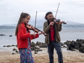 Molly andad play on the beach
