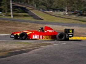 Dean Amos in his Gould GR55B Nicholson McLaren V8 exiting the hairpin