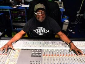 The Artist posing with his equipment for a photo