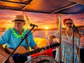 Mango Junction band with sunset backdrop