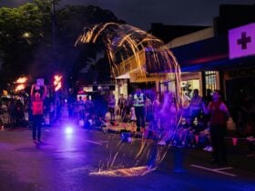 Fire twirler in Mary Street