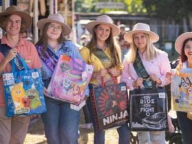 2023 Show Ambassadors standing outside holding showbags