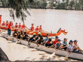Two boats of teams competing on the Balonne River