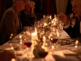A candlelit dining table at The Long Apron