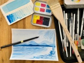 painting of palm cove with brushes and paints and tonal swatches