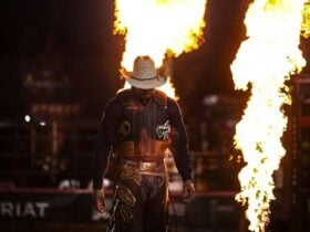 PBR cowboy walking into arena