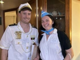 two people dressed in old world sailing costume