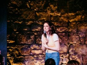 Emma Holland on stage at Good Chat Comedy Club