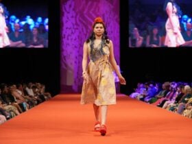 Model walking the runway wearing Magpie Goose brand