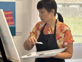 Artist creating her masterpiece