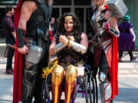 Three cosplayers posing for a photo at Supanova Comic Con and Gaming, dressed as superheroes