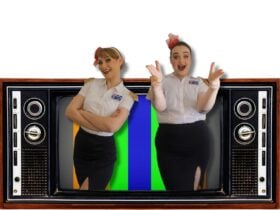 Two ladies dressed in flight attendant outfits popping out of an old brown tv.
