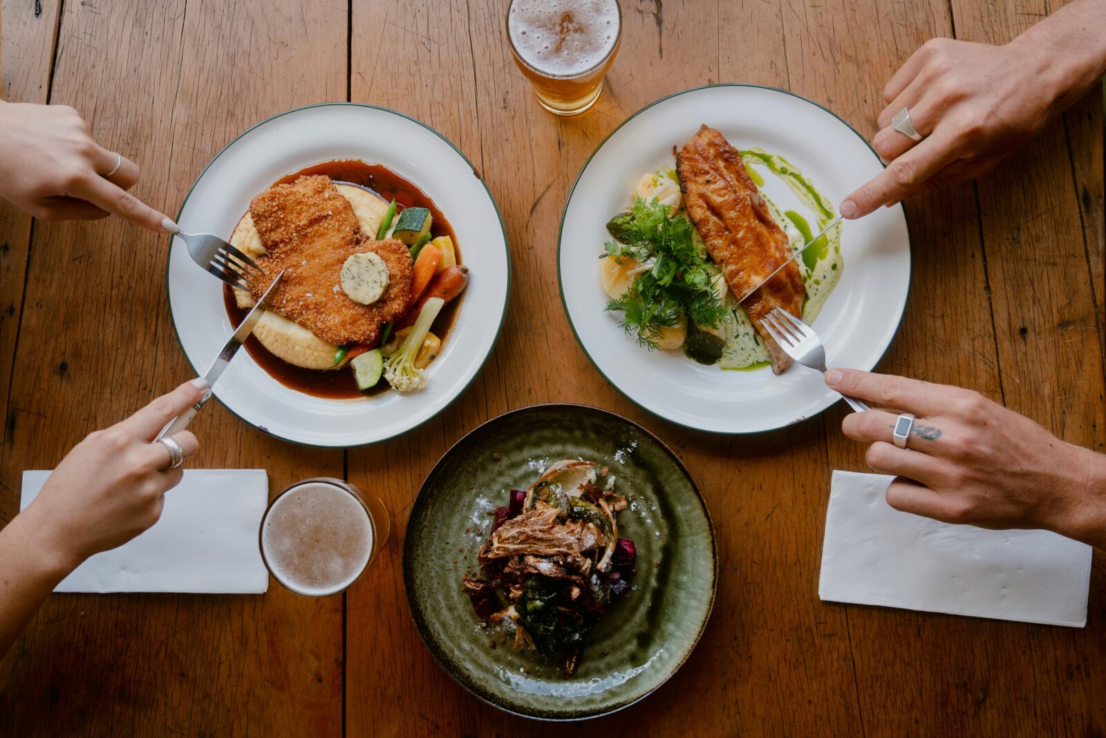 3 plated of food on a table