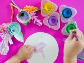 child creating with watercolour