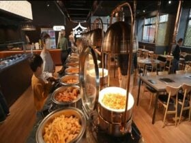 Hot buffet section with a variety of Korean dishes including fried chicken and tteokbokki.