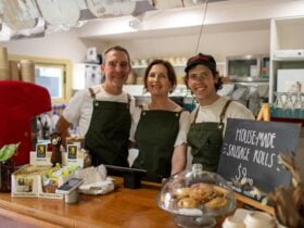 friendly staff greeting customers at the front counter