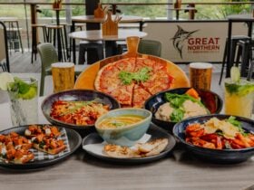 Pizza, pasta, soup, bruschetta, beer and cocktails on a table at Orion Hotel Springfield
