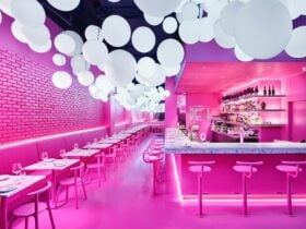 PingPong's vibrant pink main dining room which features a room drenched in bright pink hue