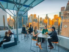 Sixteen Antlers Rooftop Bar, cocktails and sunset overlooking the city skyline