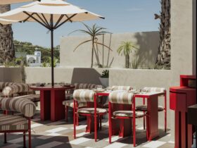 Sueno rooftop tables with open umbrella