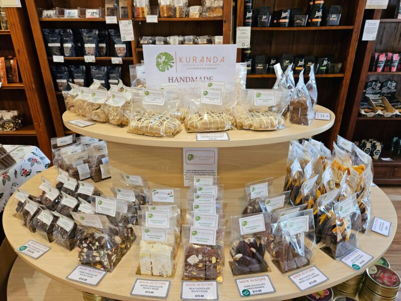A selection of fruits and confection coated in milk, dark or white couverture chocolate.