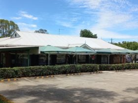 Our lovely building with the umbrellas over our Tea Garden for shade while enjoying a Devonshire Tea