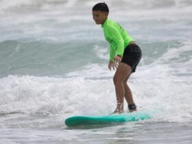 Surfing on green wave with green board