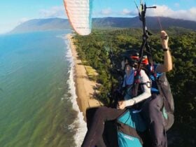 tandem paragliding along the coast