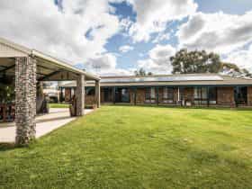 large lawned areas, under cover BBQ
