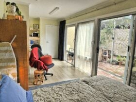 studio apartment with workspace, kitchenette, bathroom and courtyard