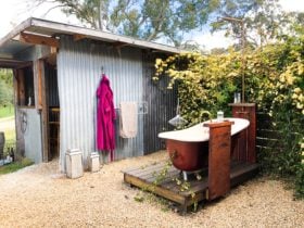 Enjoy a soak , with a wine and the kookaburras.