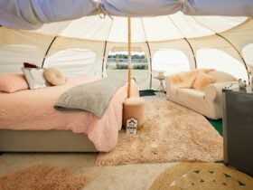 Our gorgeously decorated Tent offers a King Bed or Twin Singles