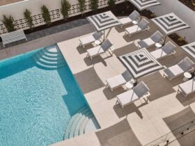 Outdoor pool with sunbeds