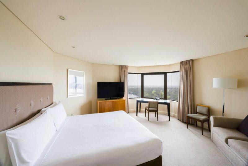 Photo of a king bedroom with the view of River Torrens on high floor