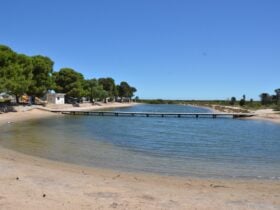 Tidal saltwater swimming pool adjacent to caravan park