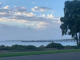 long view of beach and jetty