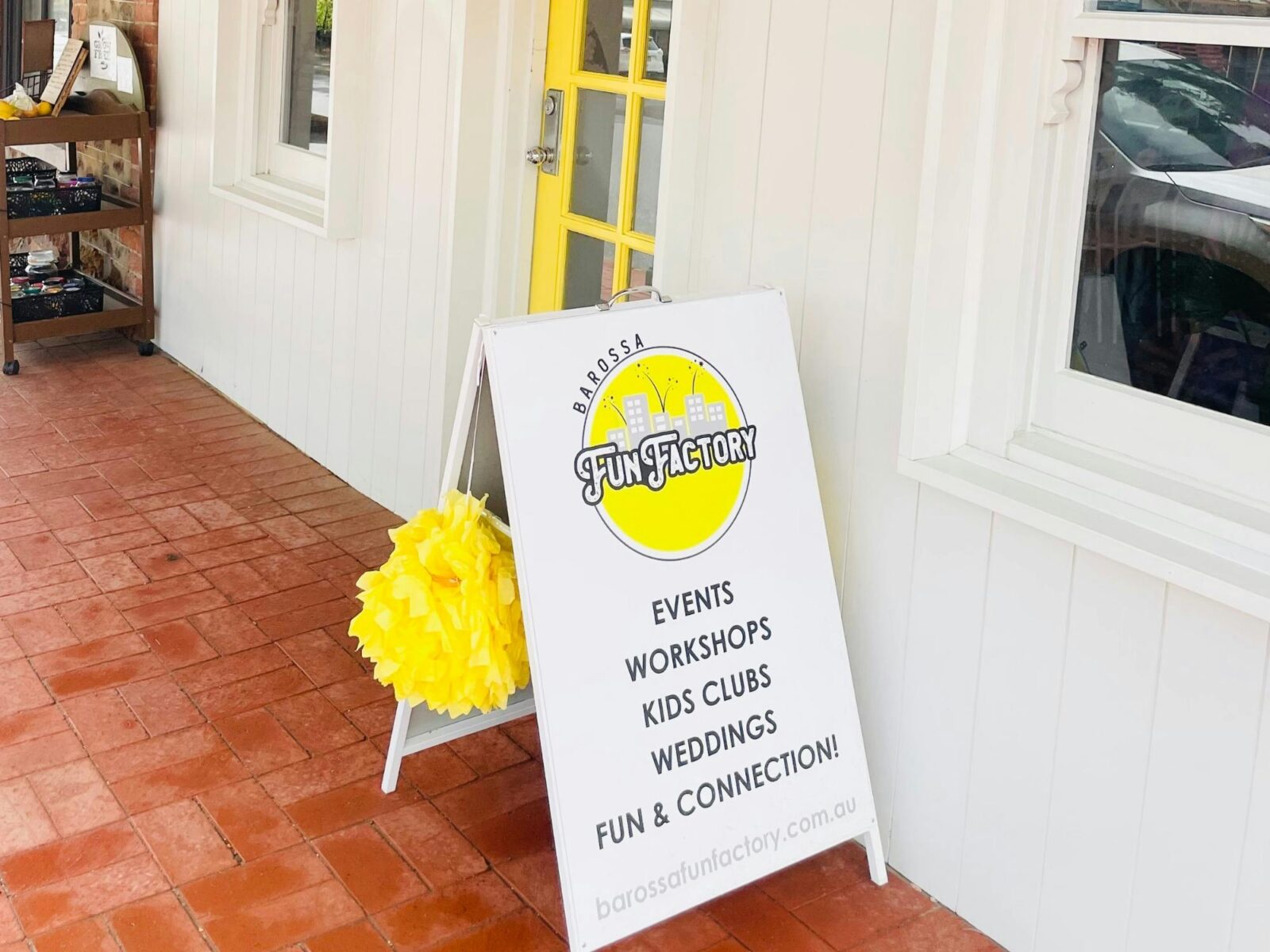 Yellow door with sign