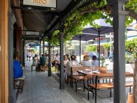 Visitors enjoying food at local eateries