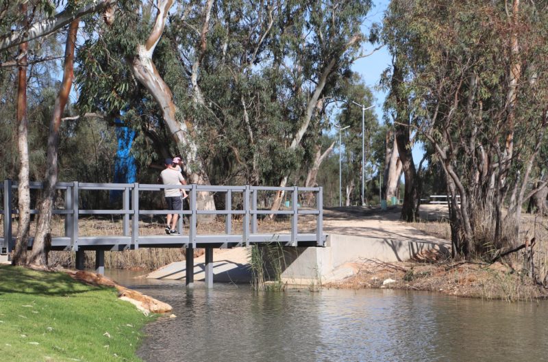 People can access the island via a footbridge.