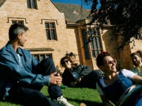 People relaxing on Carrick Hill lawns