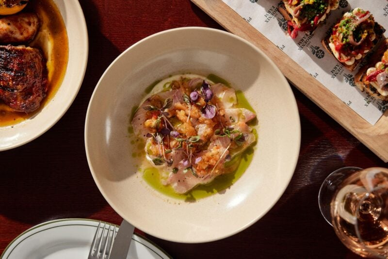 Fresh raw fish with citrus, olive oil and micro herbs served at Lost Phoenix Farm restaurant